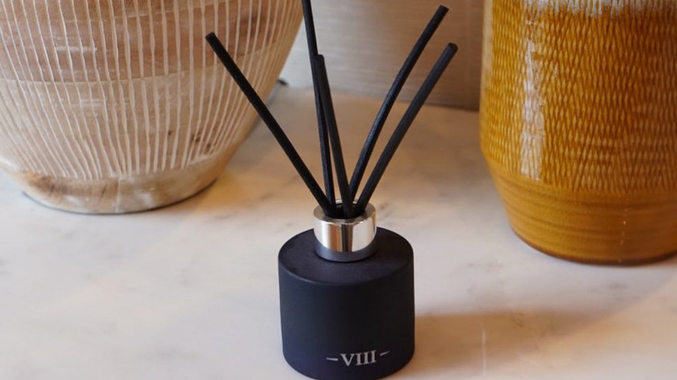Wellbeing Through Fragrance: Essential Oils vs. Scented Candles