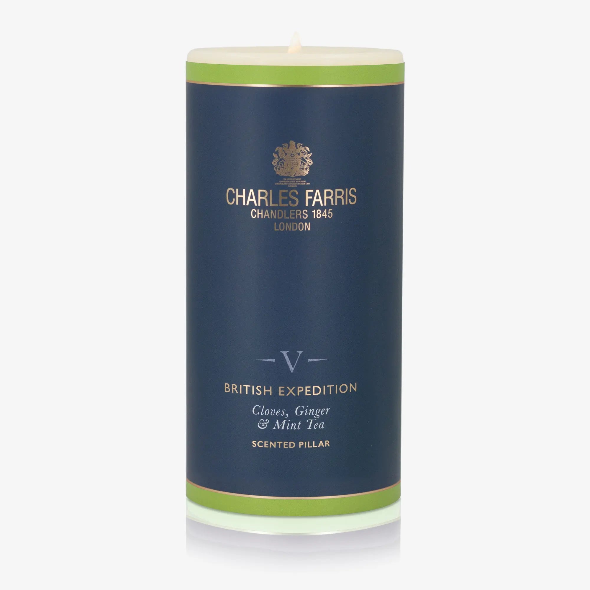 Candle in a blue label with 'Charles Farris' branding on a white background