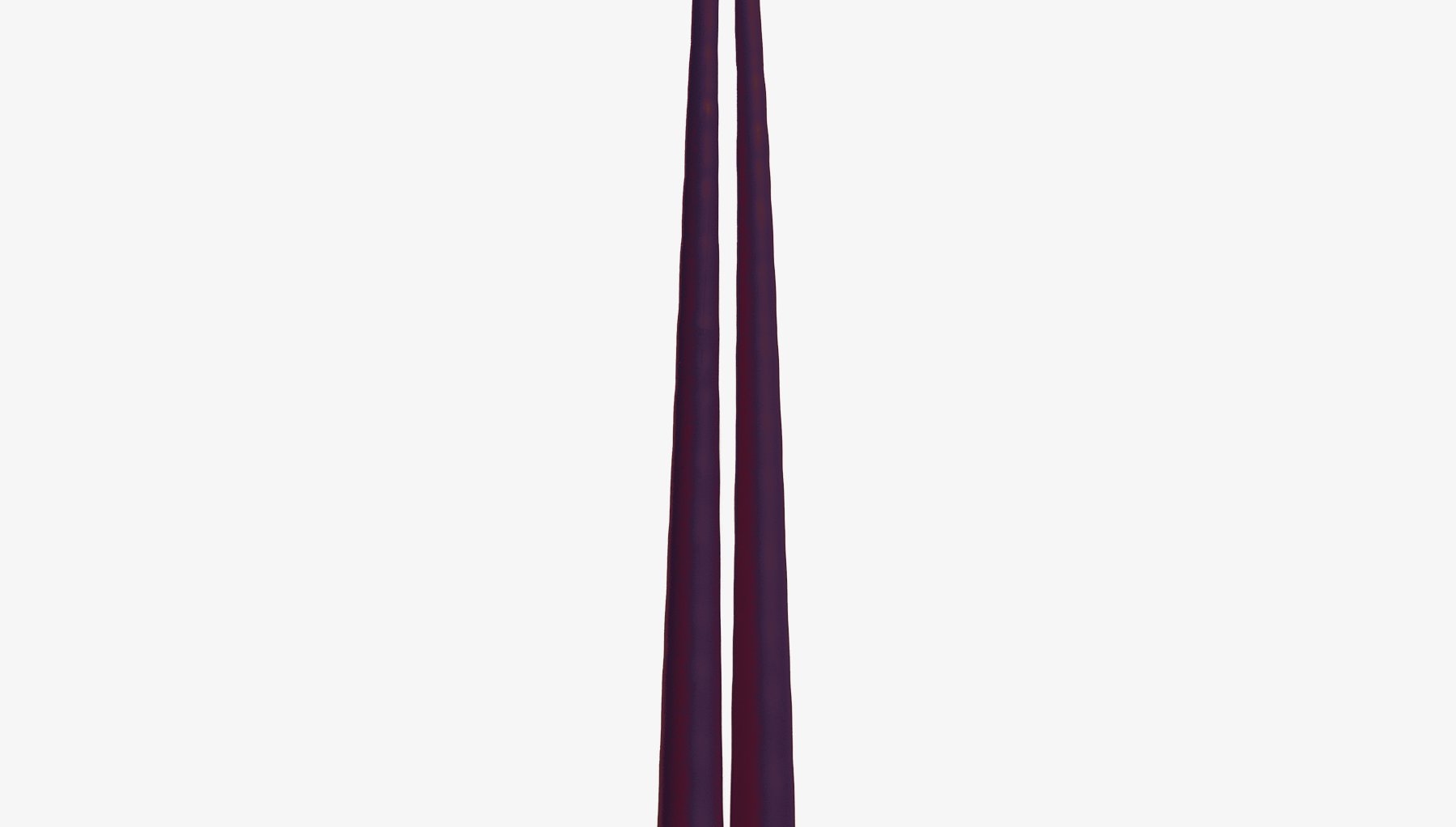 Two purple candles on a white background