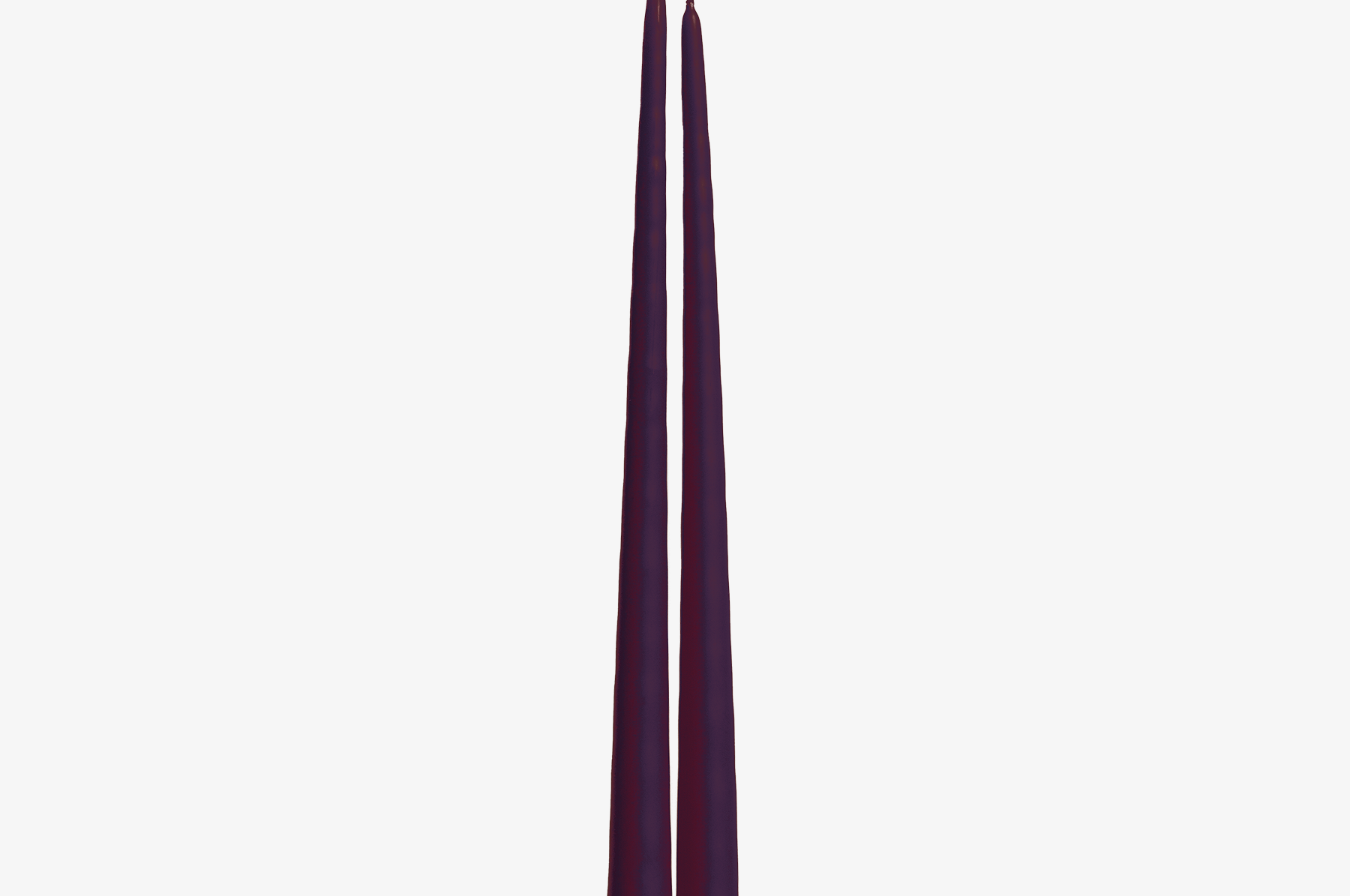 Two purple candles on a white background