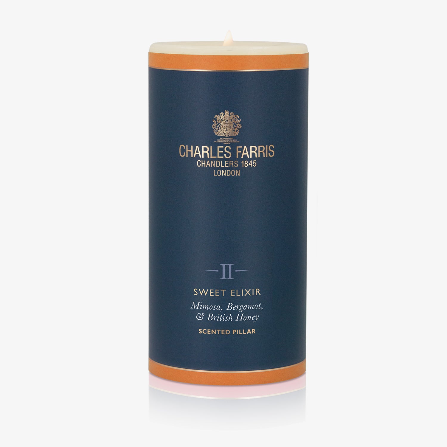 Sweet Elixir Scented Pillar Candle.
