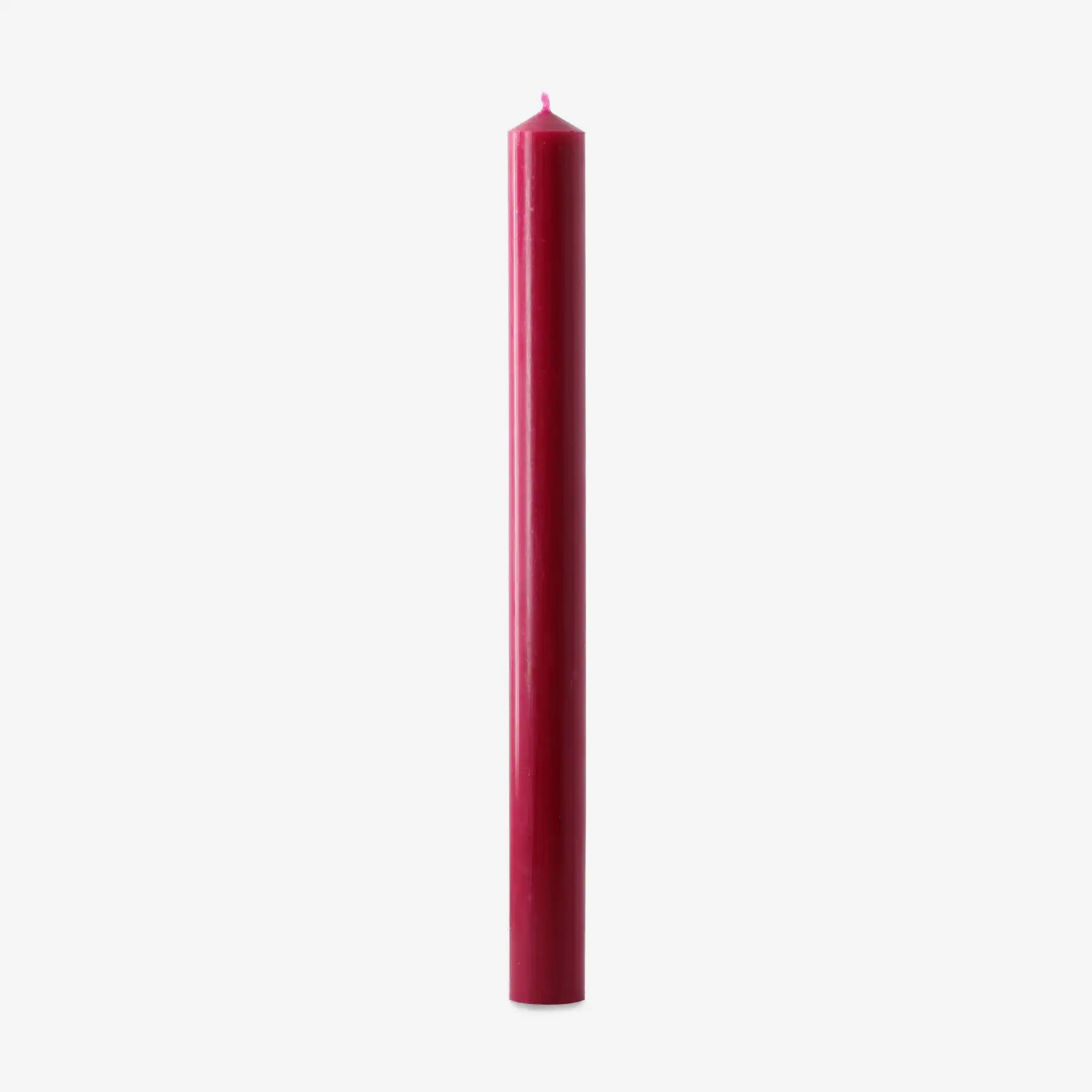 Red candle on a white background