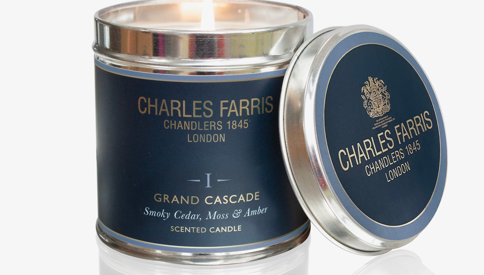 Charles Farris Grand Cascade scented candle with lid on a white background