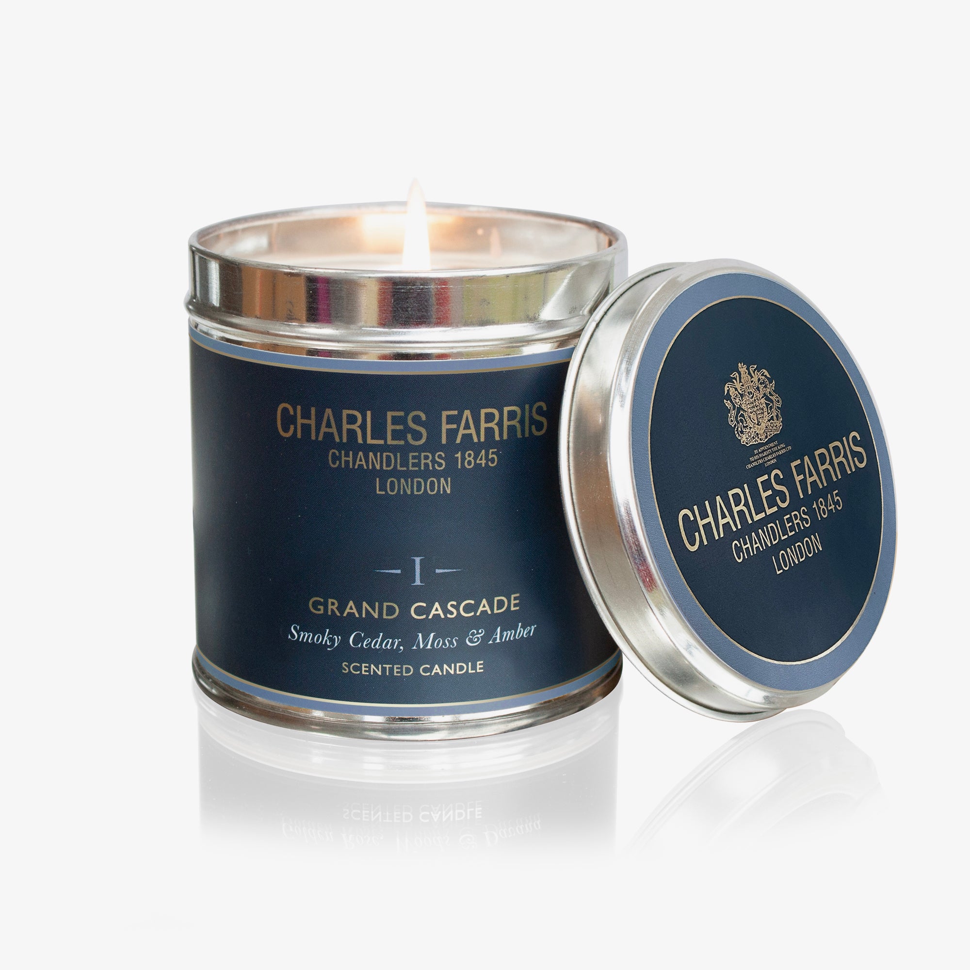Charles Farris Grand Cascade scented candle with lid on a white background