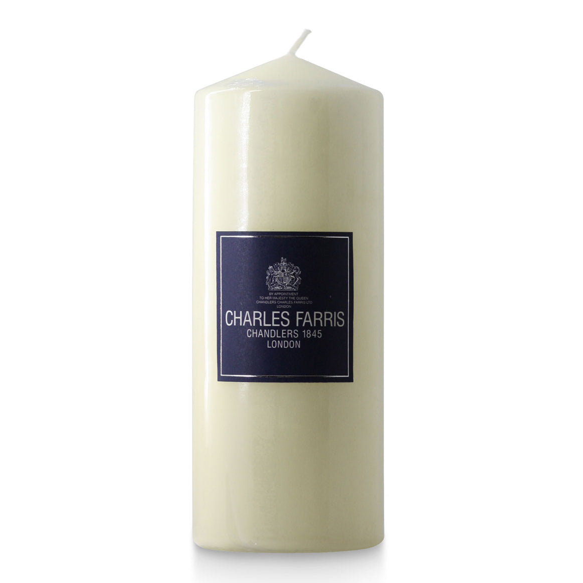 Ivory candle with a label on a white background