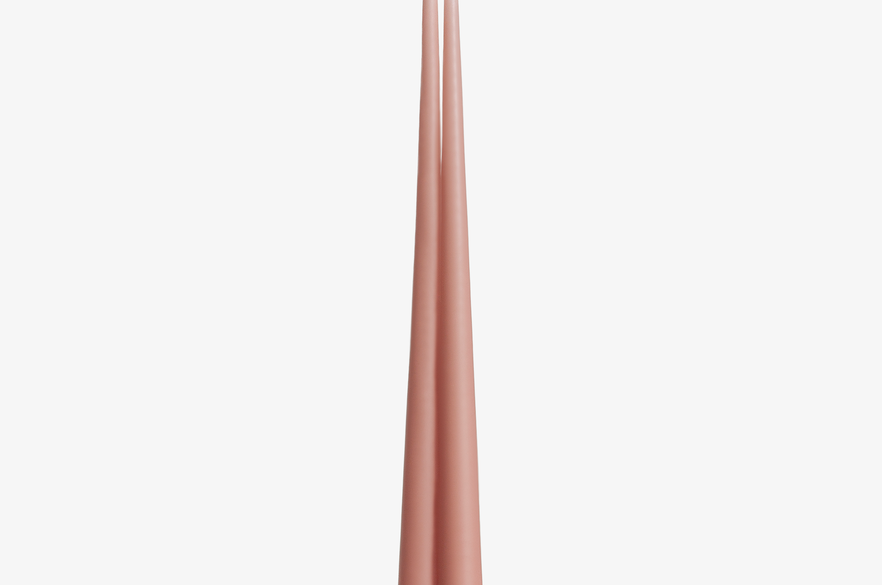 Two tall, thin, pink candles on a white background