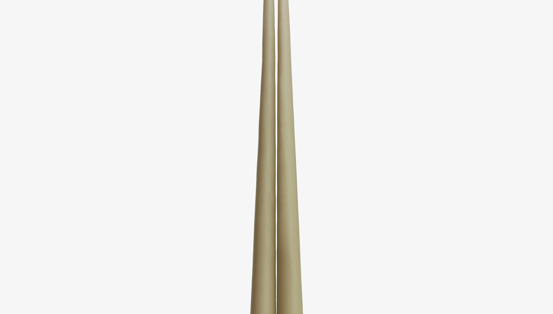 Two beige candles on a white background