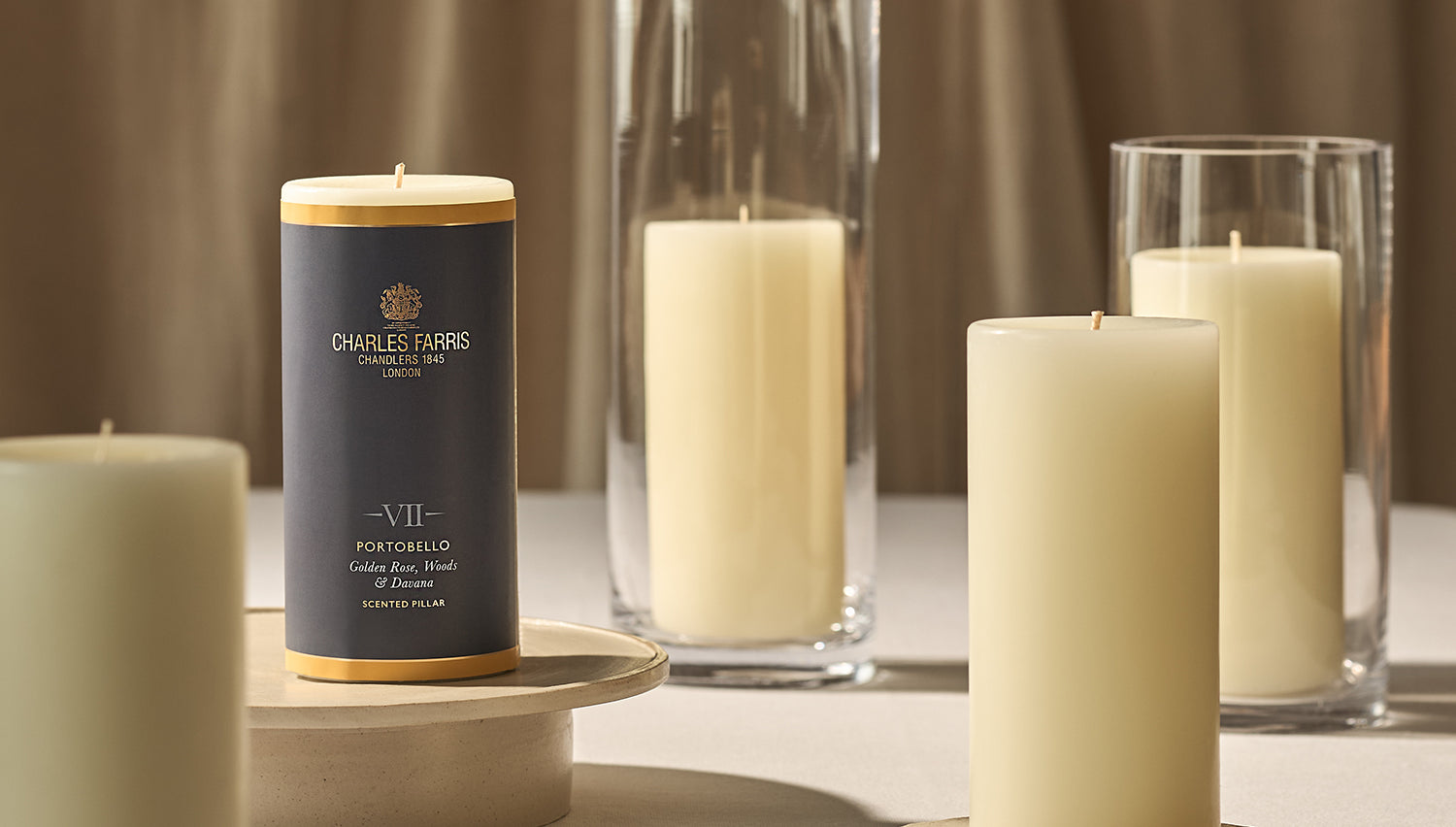 A collection of scented pillar candles.