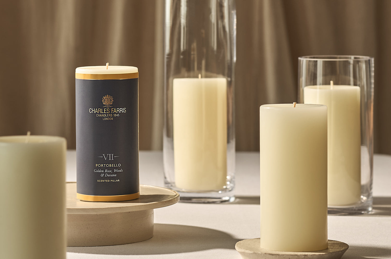A collection of scented pillar candles.