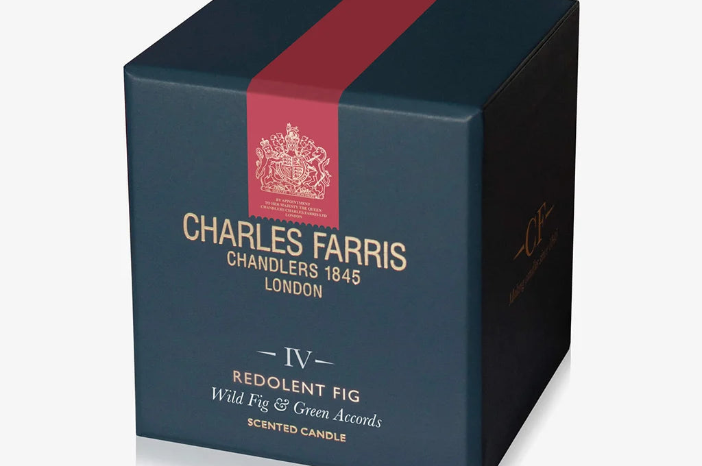 Charles Farris scented candle box with a red stripe on a white background