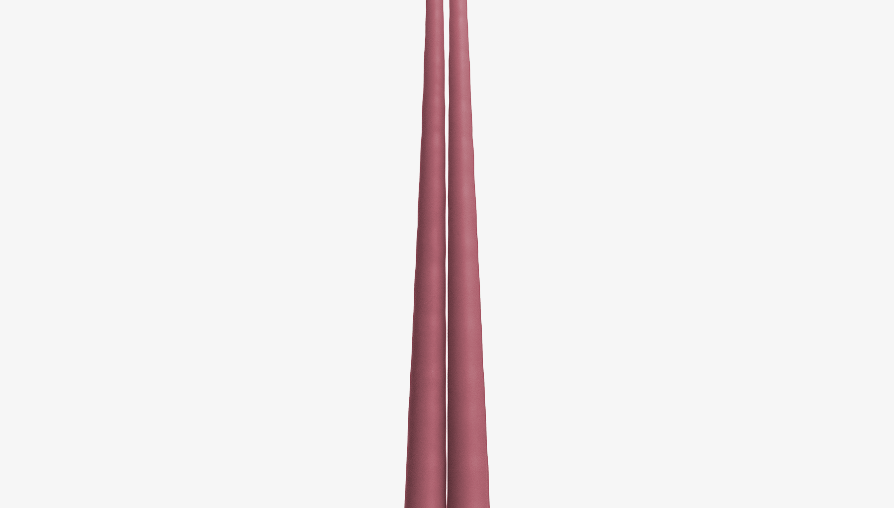 Two pink candles on a white background