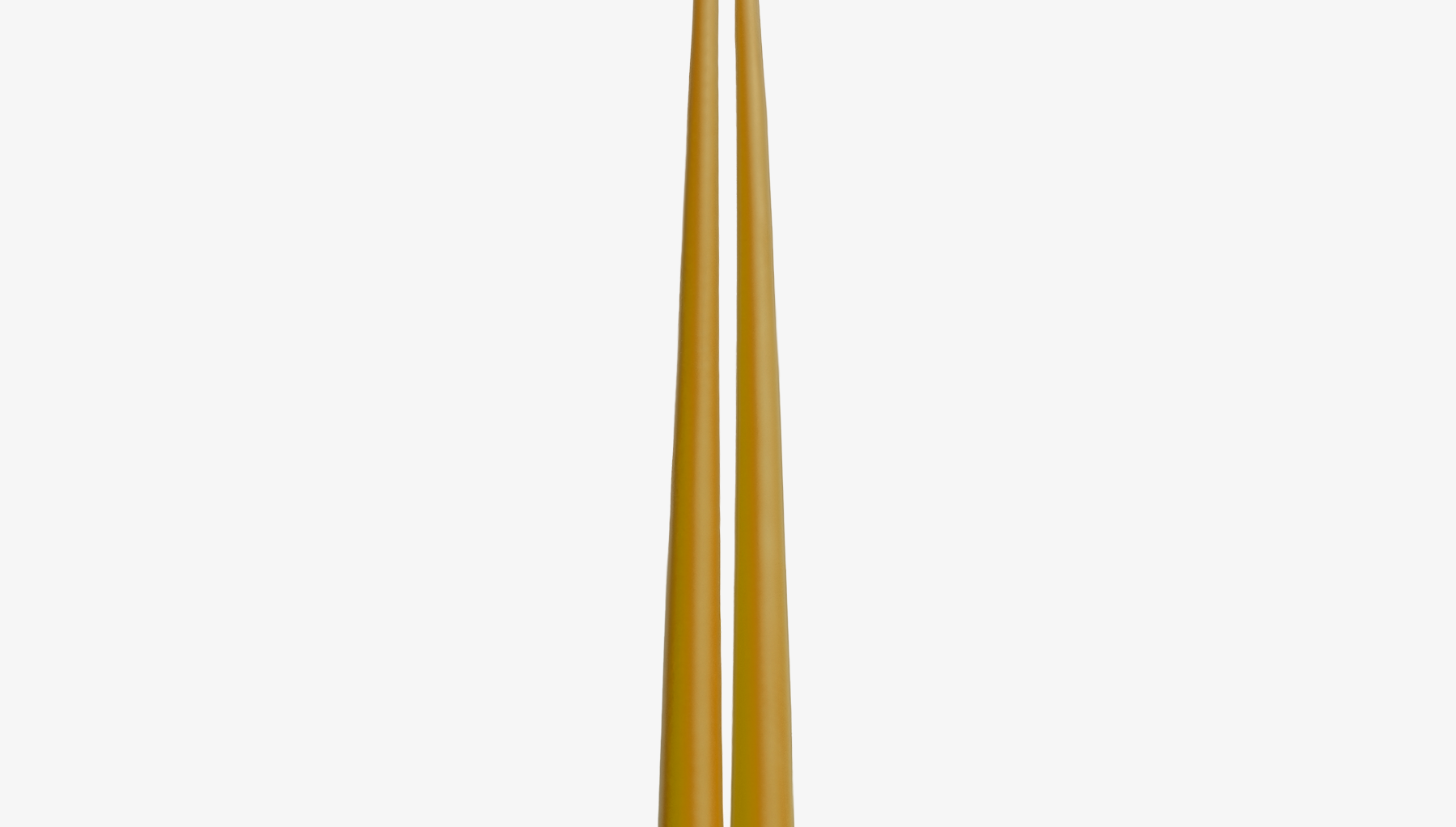 Two gold candles on a white background