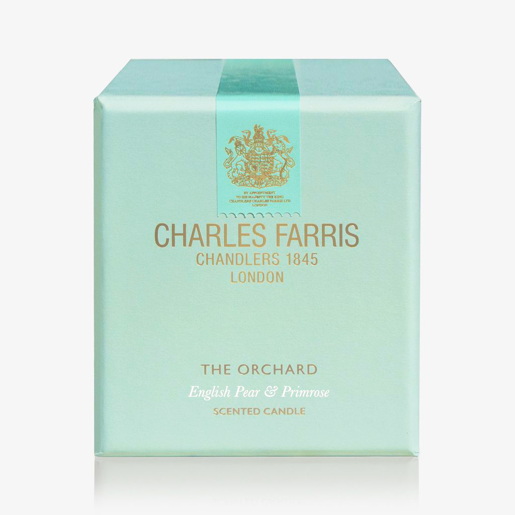 Mint green box of Charles Farris scented candle on a white background