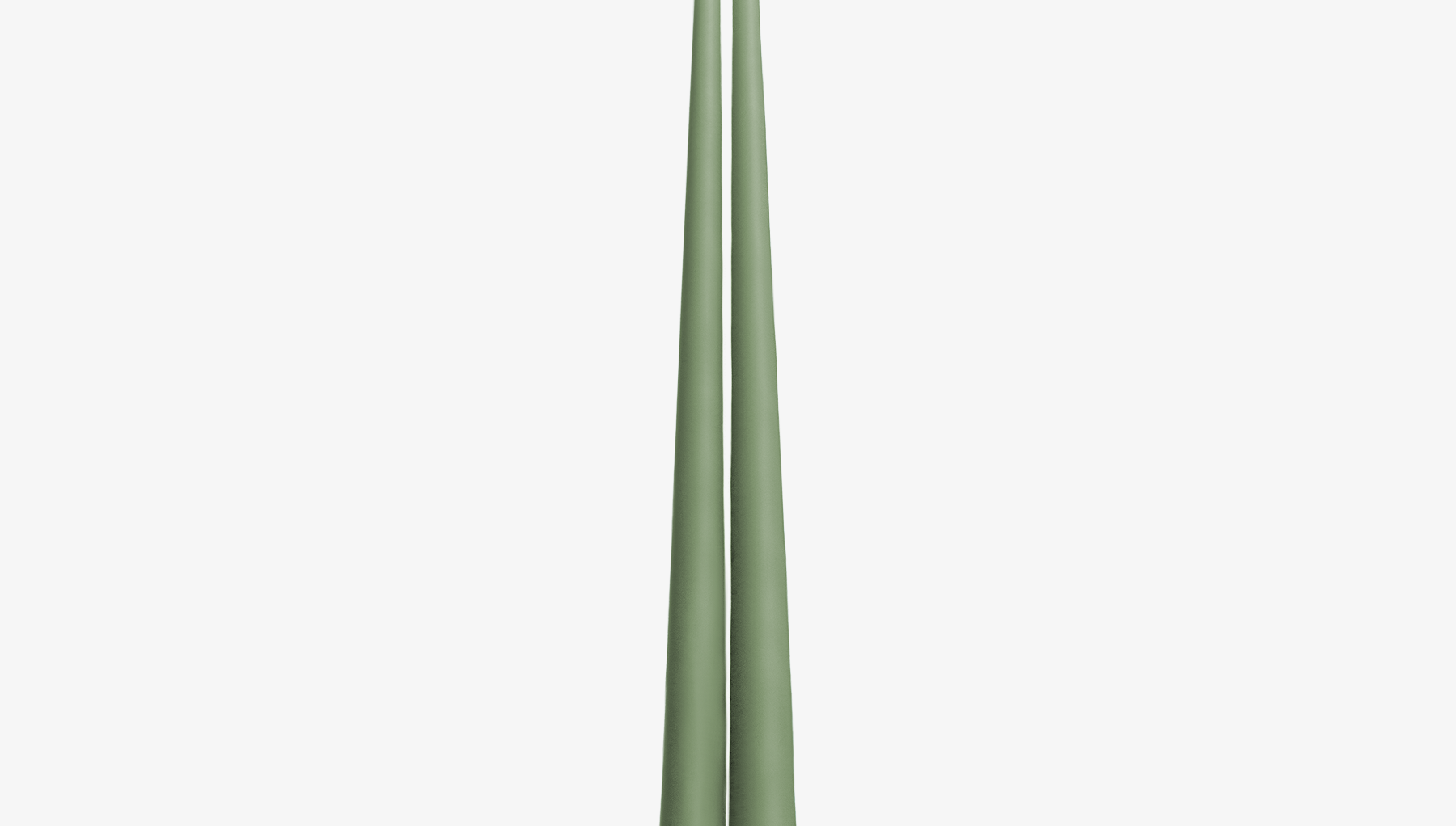 Two green candles on a white background