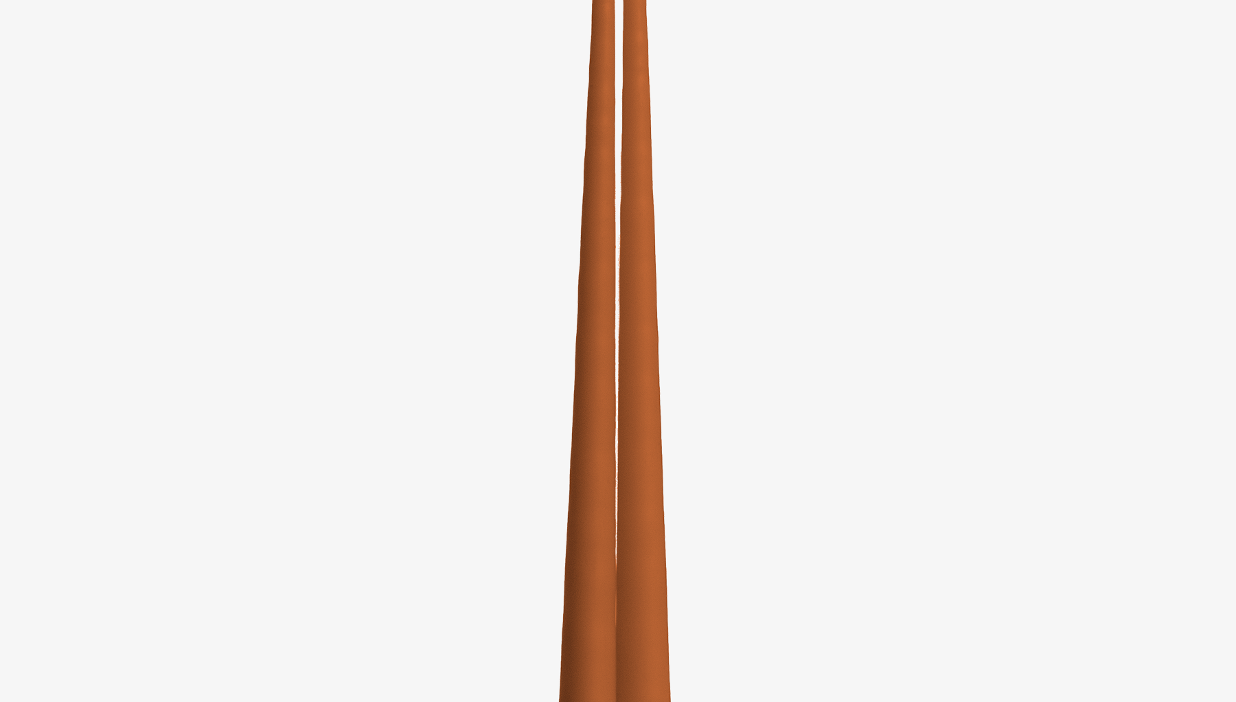 Two tall, thin, orange candles on a white background