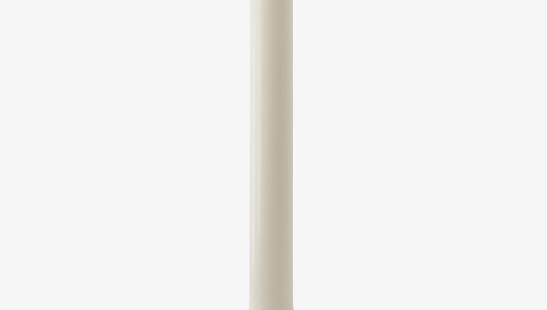 White candle on a white background