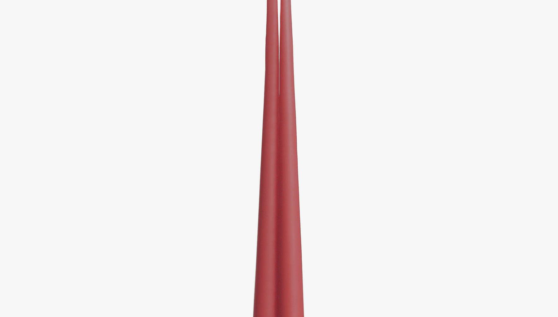 Two pink red candles on a white background