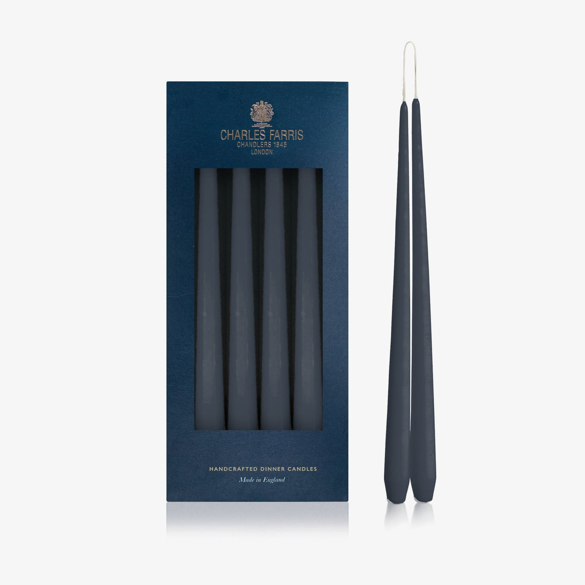 Charles Farris Deep Navy hanging pair dinner candles in their navy box, with one pair joined at the wick, made in England