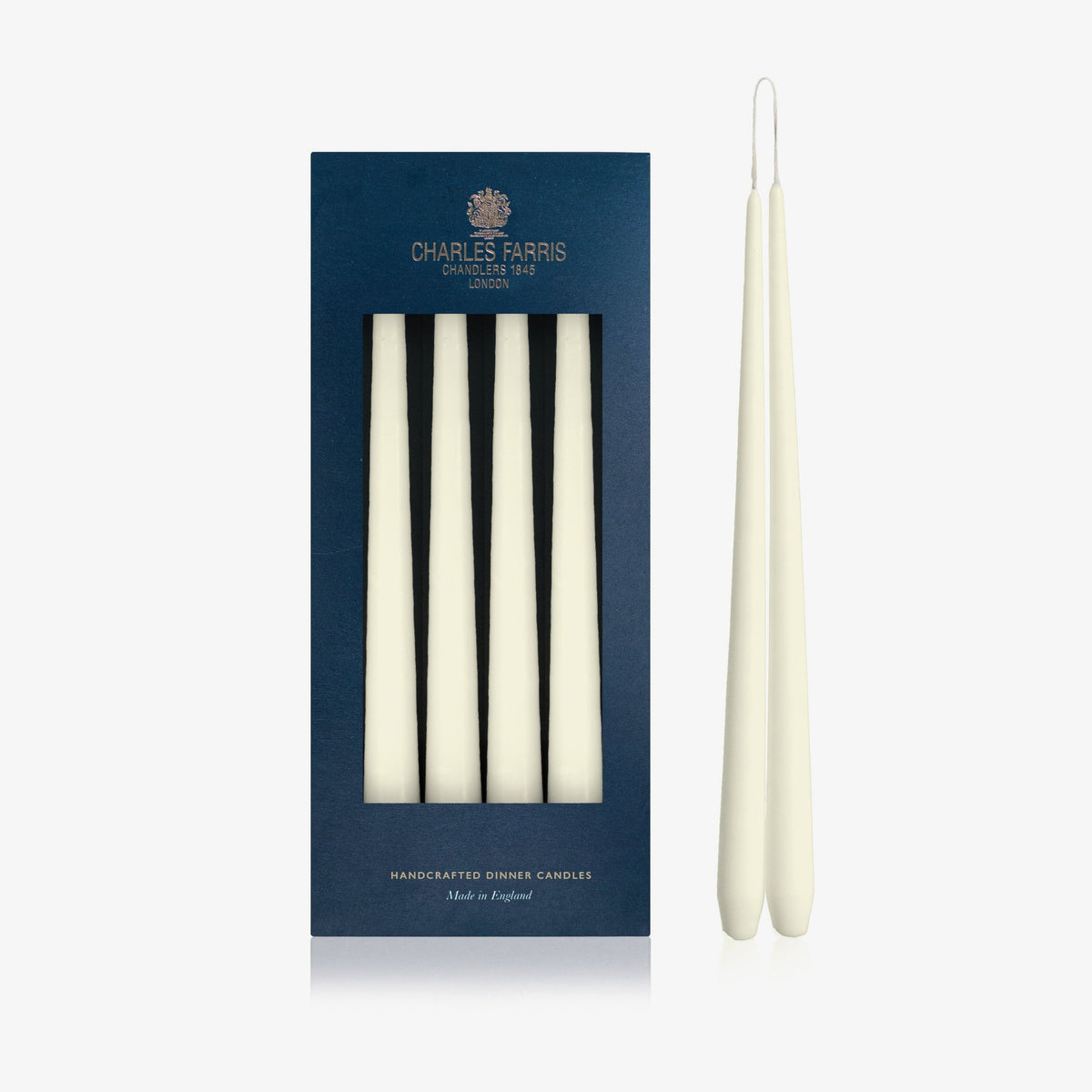 Charles Farris Ivory hanging pair dinner candles in their navy box, with one pair joined at the wick, made in England