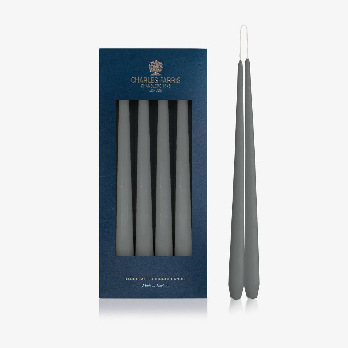 Charles Farris Ocean Blue hanging pair dinner candles in their navy box, with one pair joined at the wick, made in England