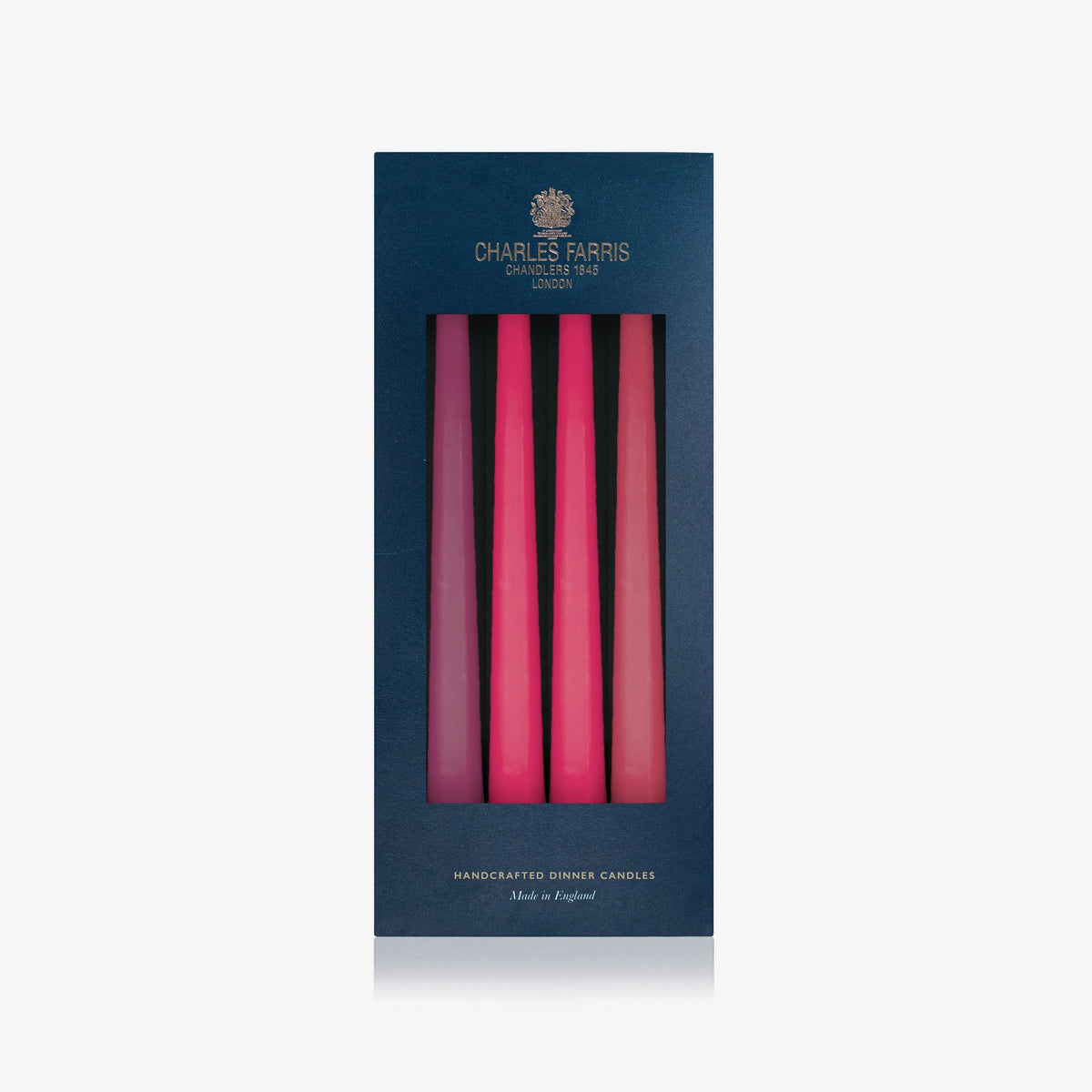Charles Farris pink tonal hanging pair dinner candles in plum, raspberry and rhubarb pink, three pairs in their navy box, made in England