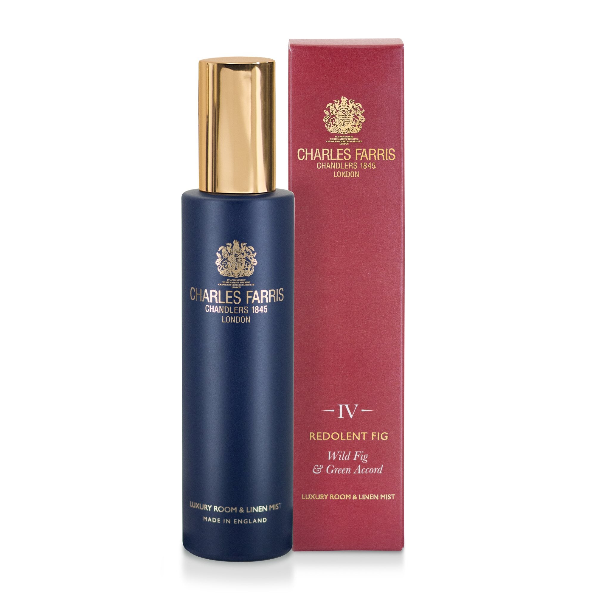Charles Farris Redolent Fig scented premium room spray fragrance home mist next to it's packaging wild fig and green accords