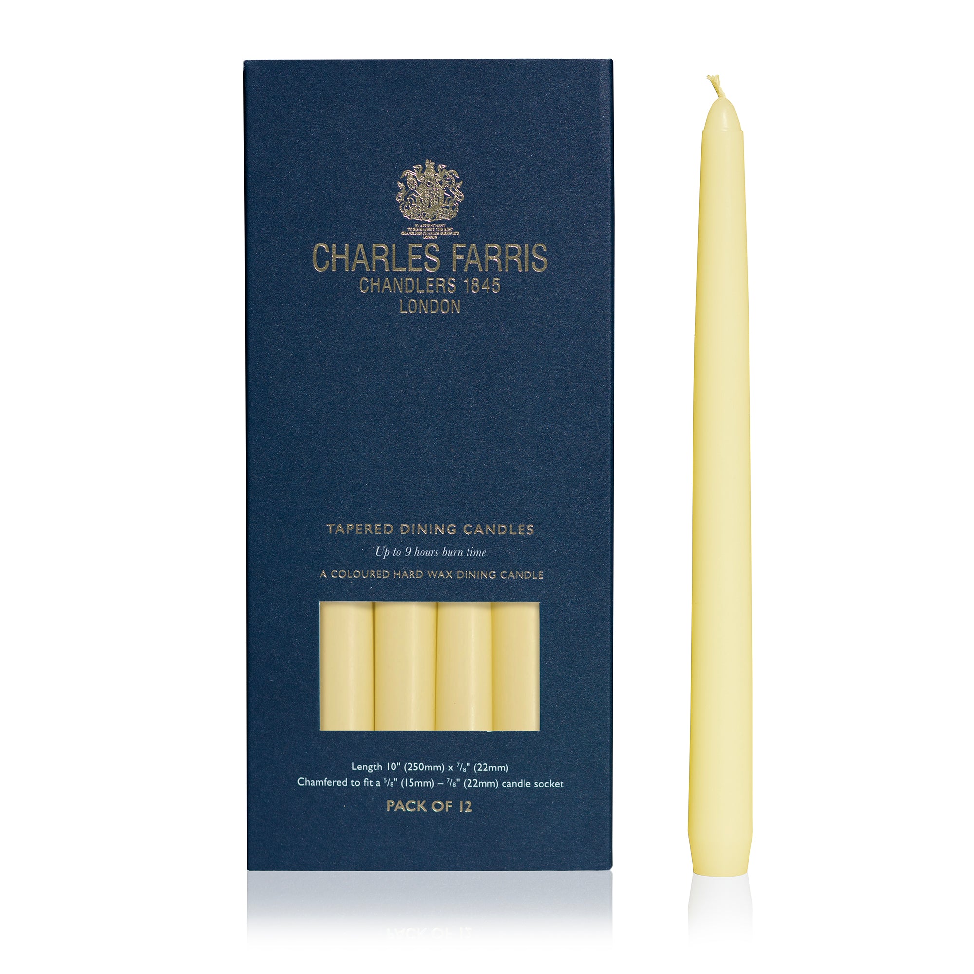 Charles Farris tapered dining candles in a navy blue box with a single pale yellow candle displayed beside it on a white background.