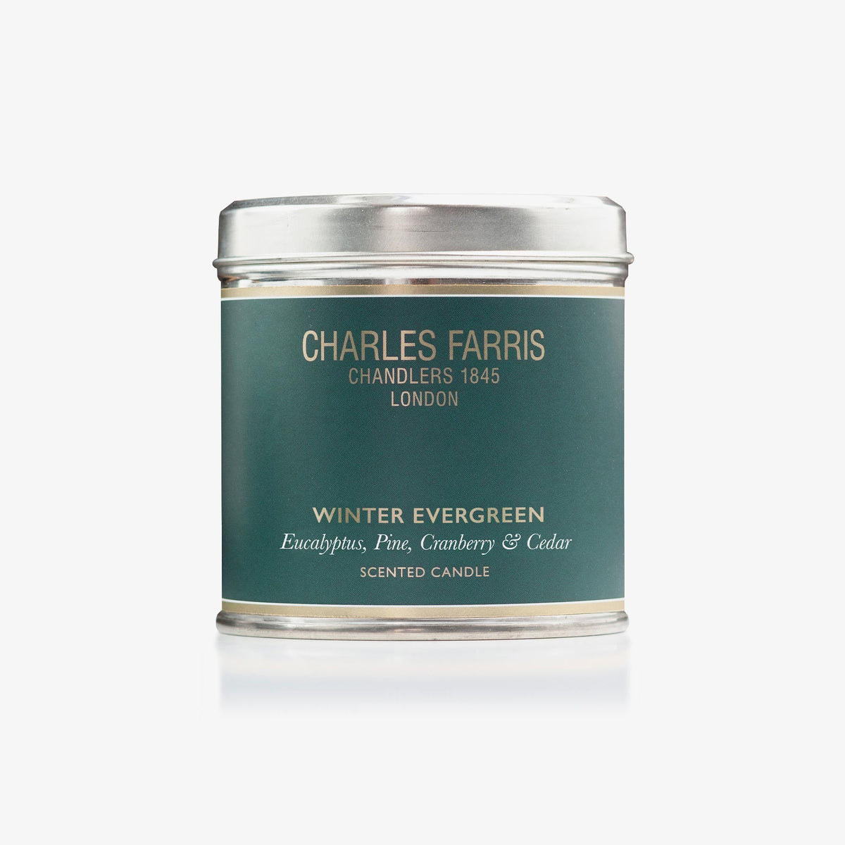 Charles Farris Winter Evergreen scented candle tin in eucalyptus, pine, cranberry and cedar