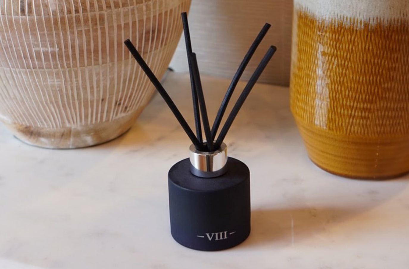 Wellbeing Through Fragrance: Essential Oils vs. Scented Candles