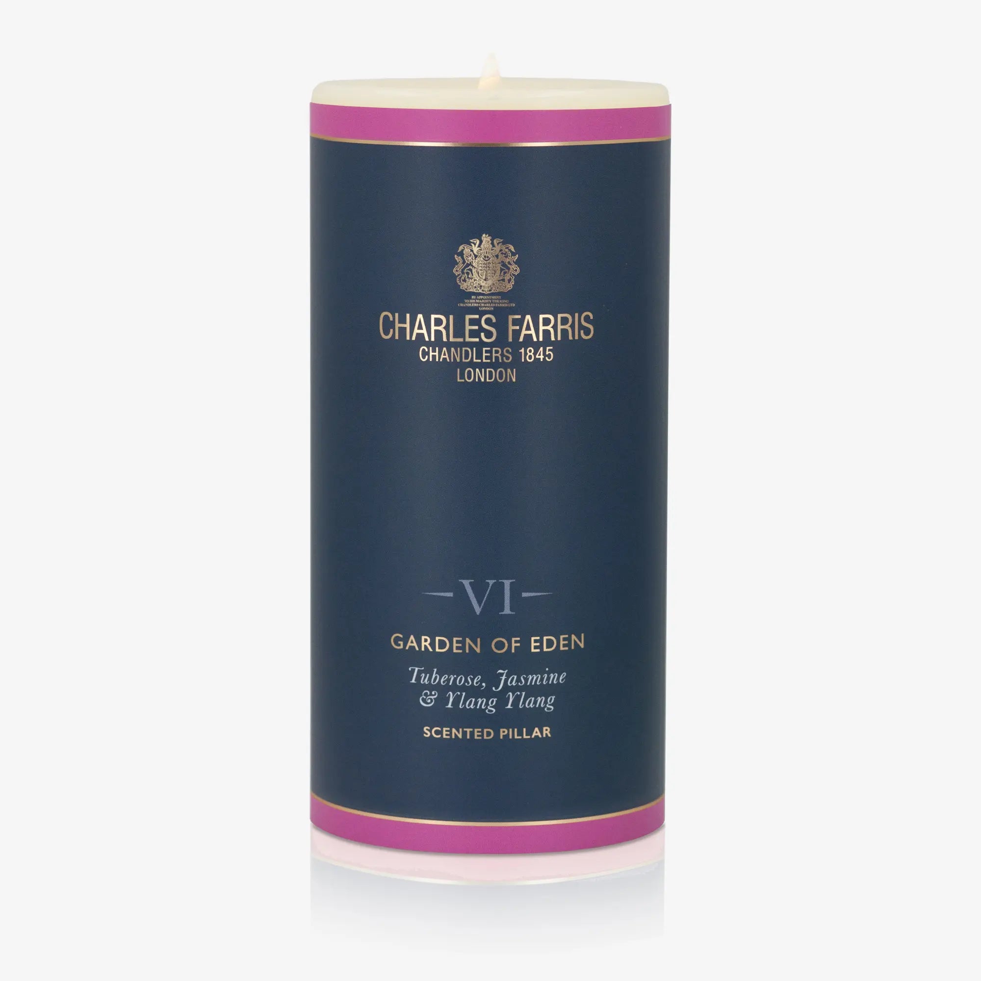 Scented pillar candle in a blue cylindrical container with 'Charles Farris' branding on a white background.