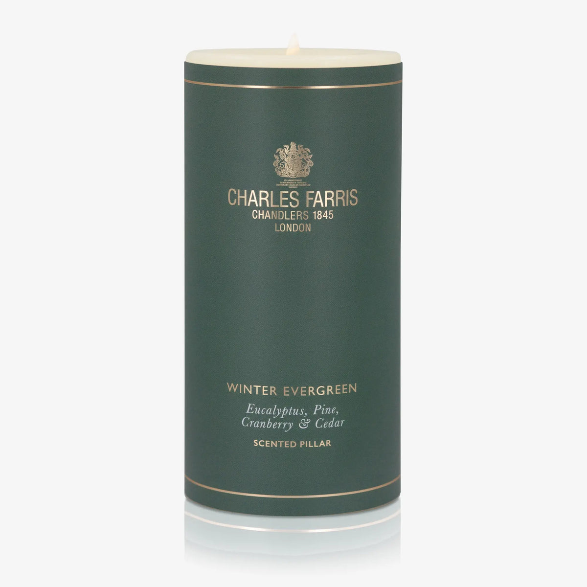Green candle with 'Charles Farris' branding on a white background
