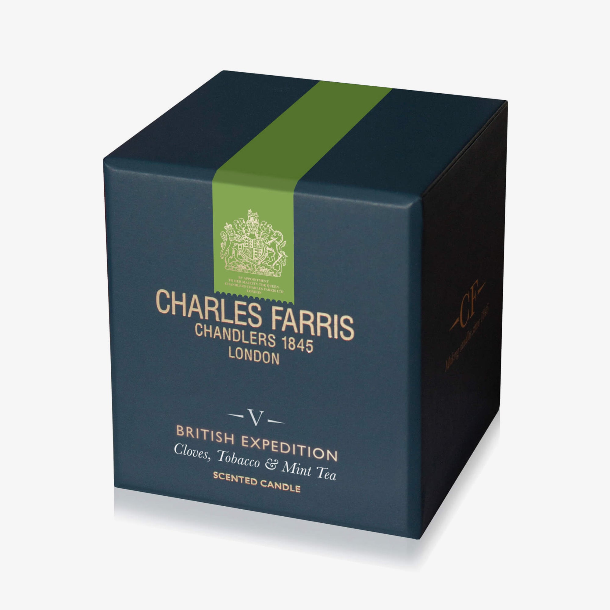 Blue candle box with green stripe and 'Charles Farris' branding on a white background