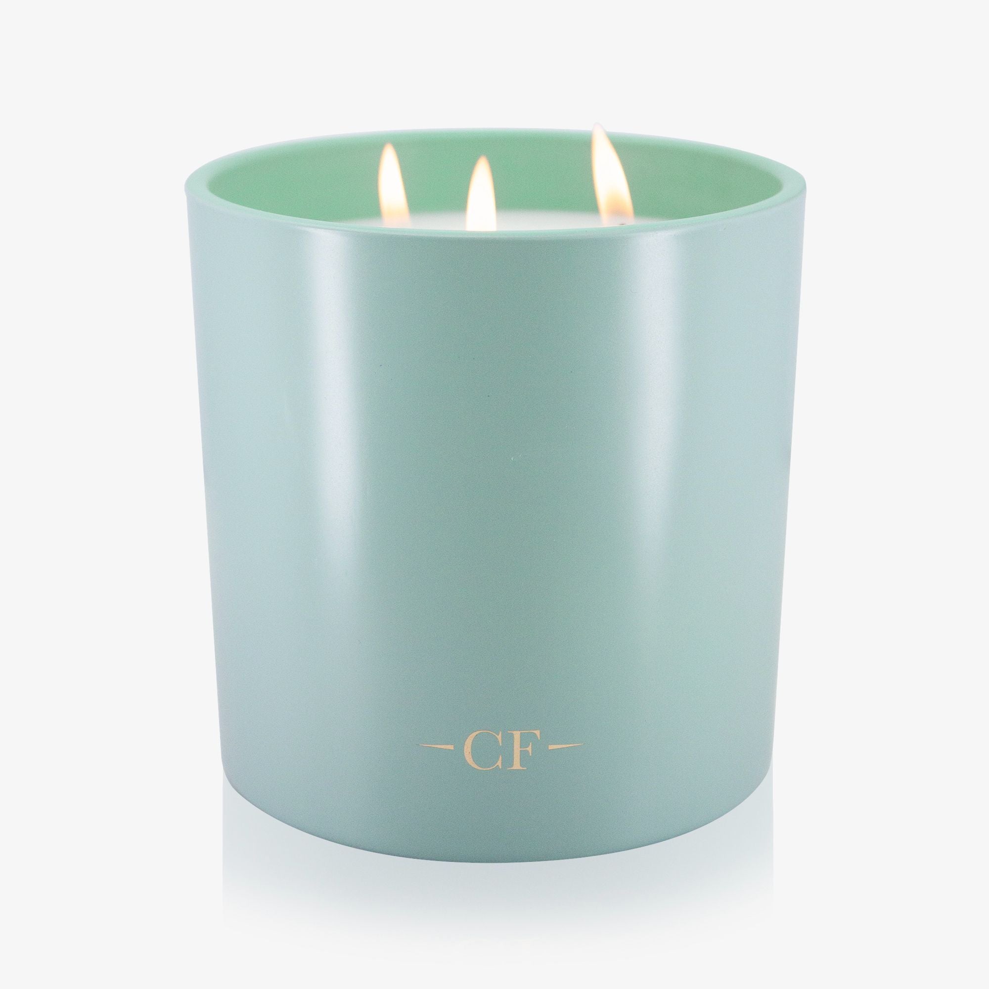 Light mint green candle with 'CF' logo on a white background