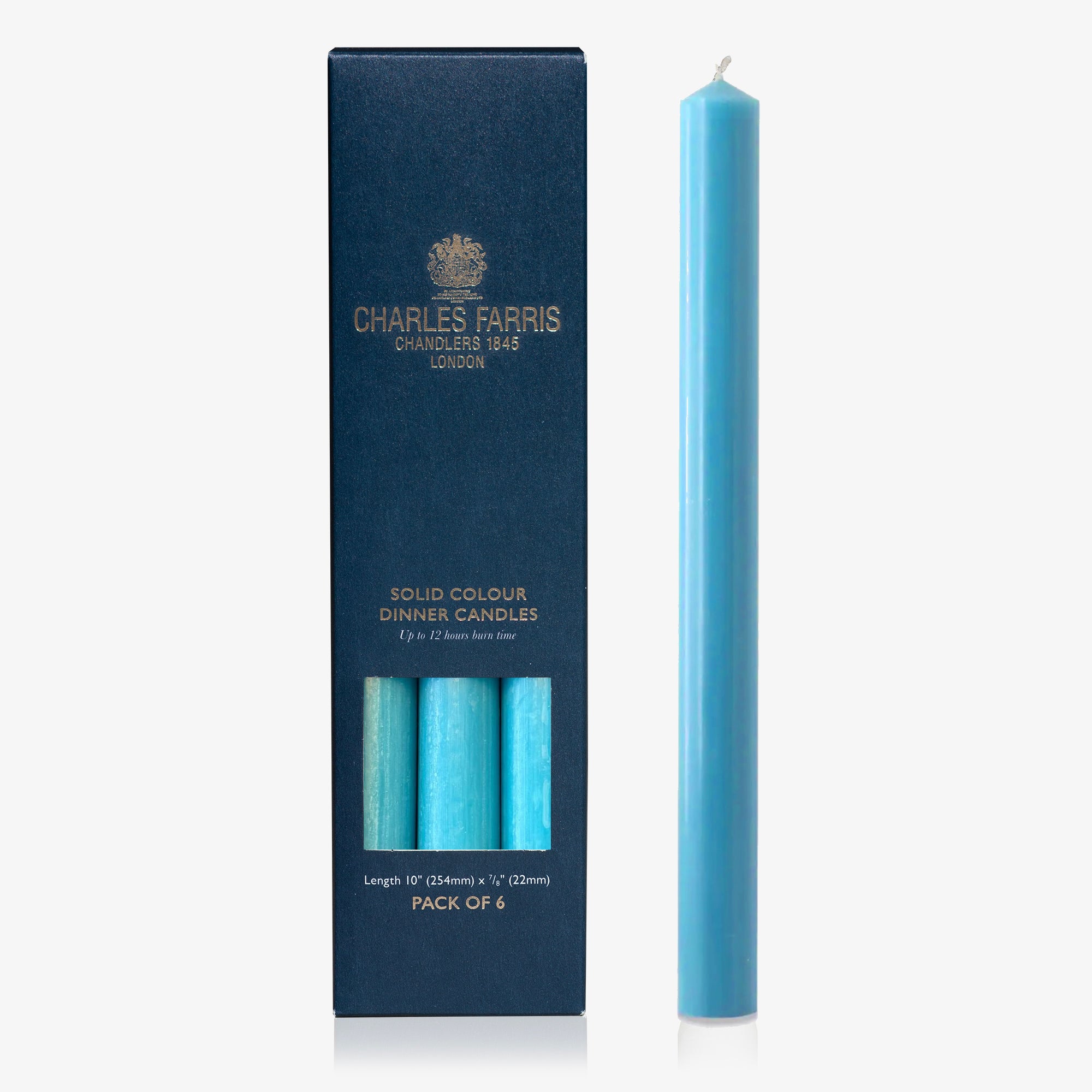 Azure Blue candle next to its packaging with 'Charles Farris' branding on a white background