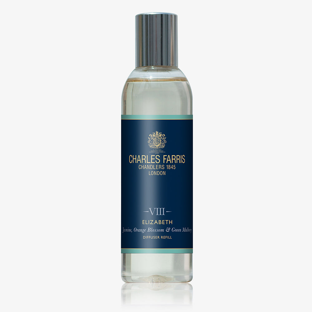 Bottle of Charles Farris diffuser refill on a white background