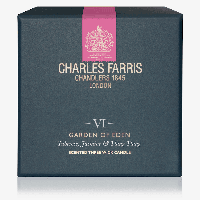 Charles Farris candle packaging with a pink ribbon and brand name on a white background