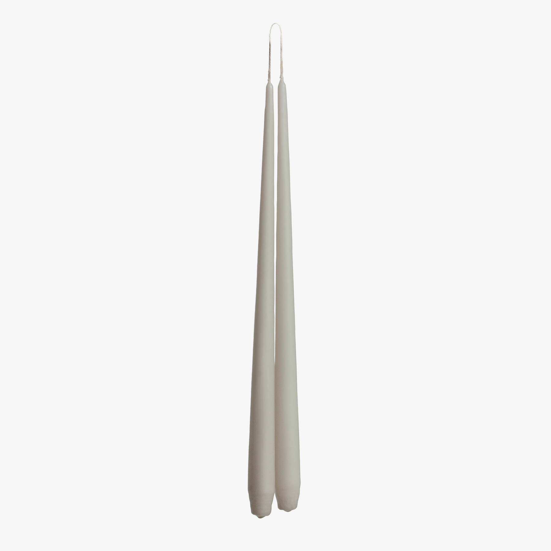Two grey candles on a white background