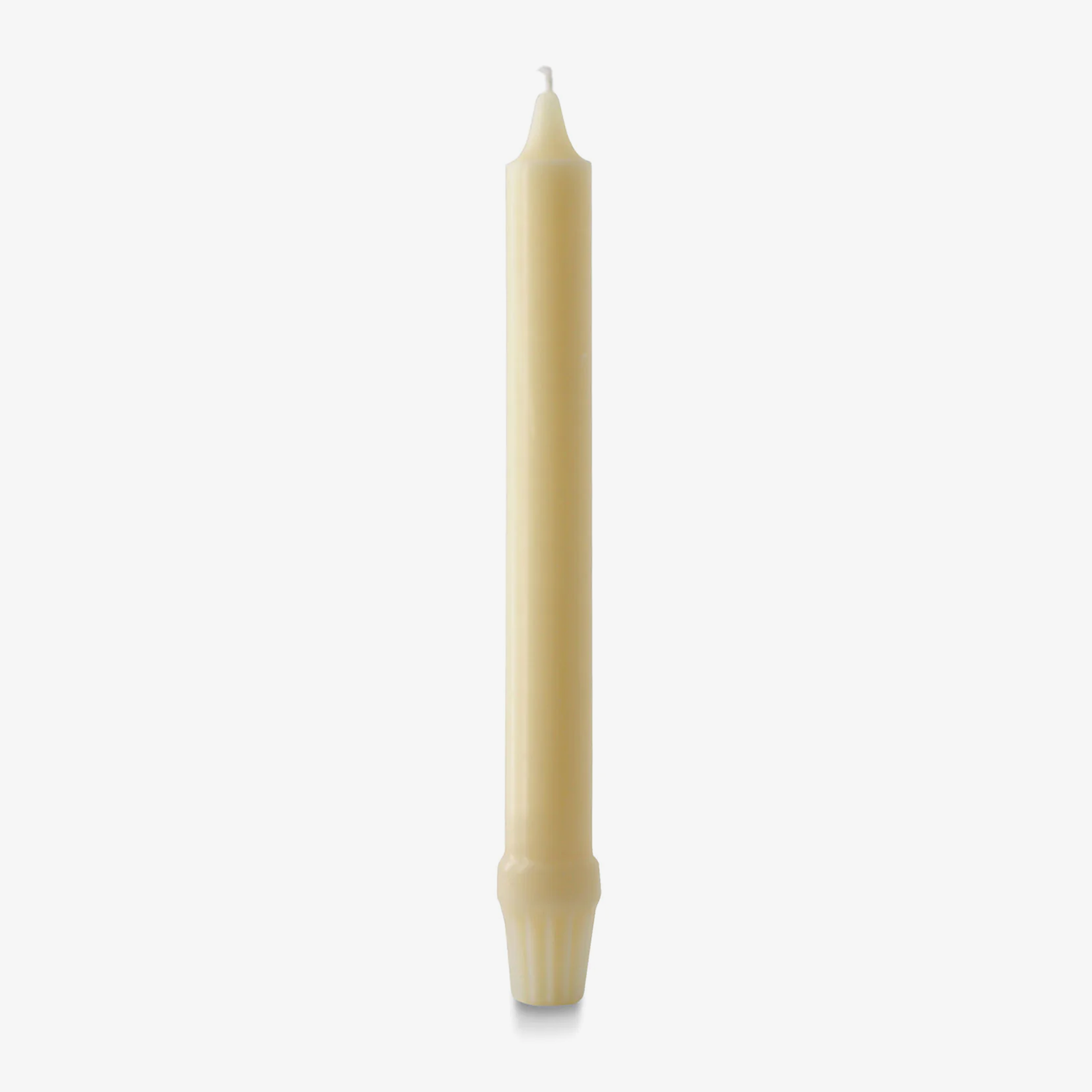 Ivory candle with a bamboo design on a white background