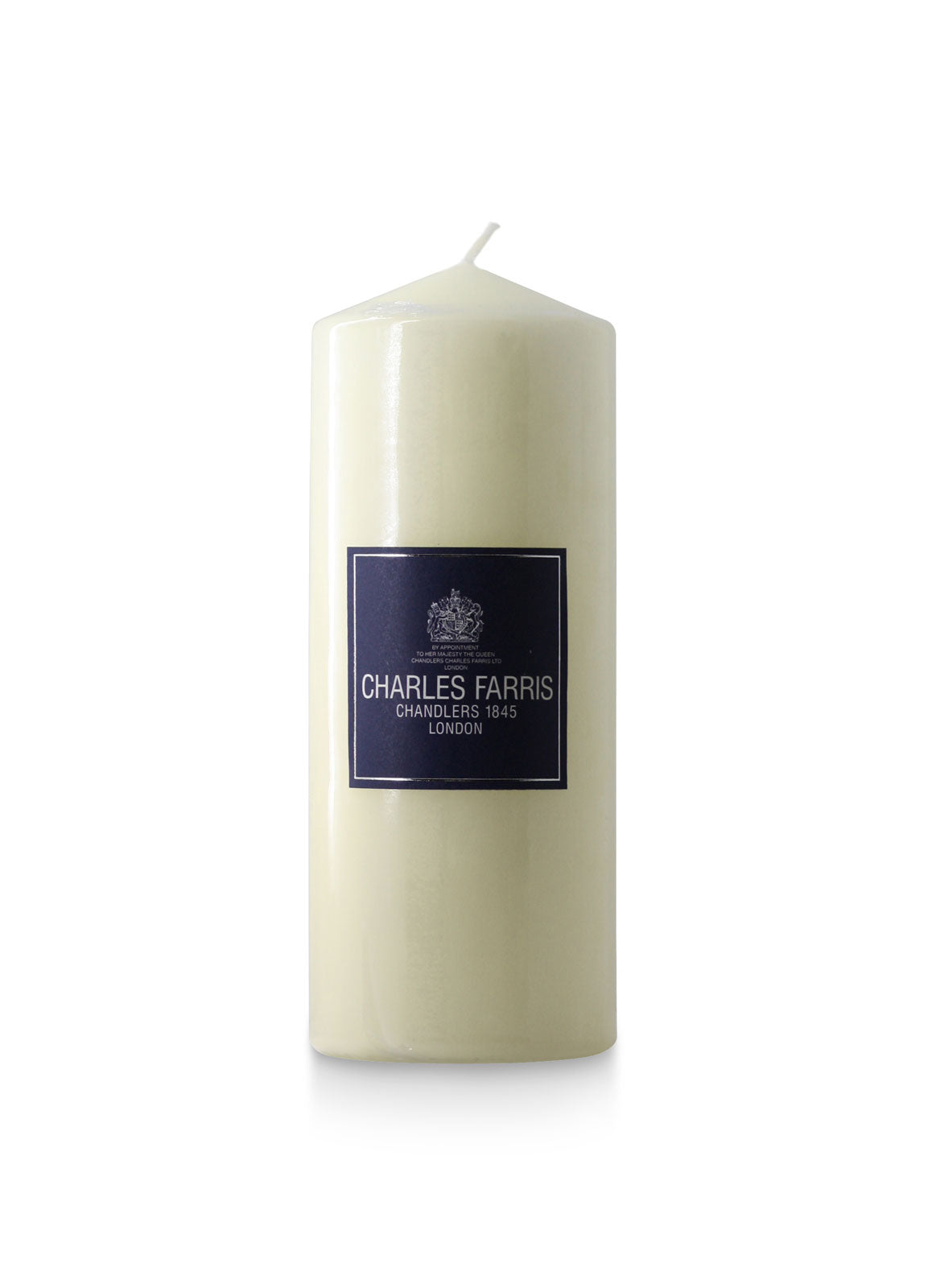 Ivory candle with a label on a white background