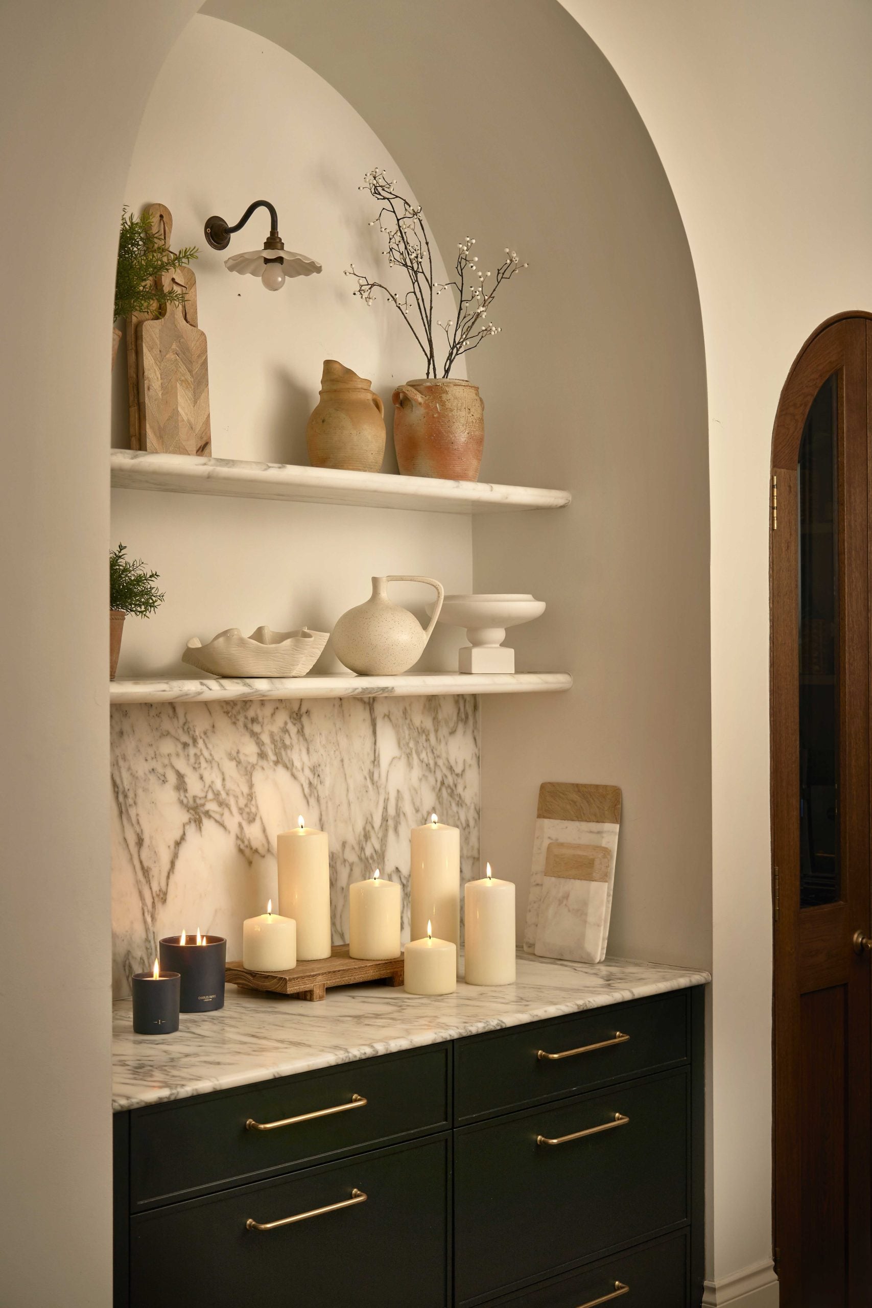 Ivory Pillar Candles on a marble surface