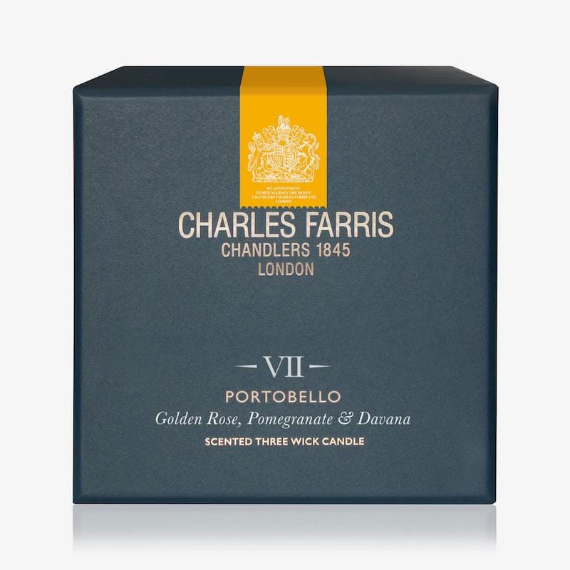 Blue box with yellow ribbon featuring Charles Farris branding on a white background