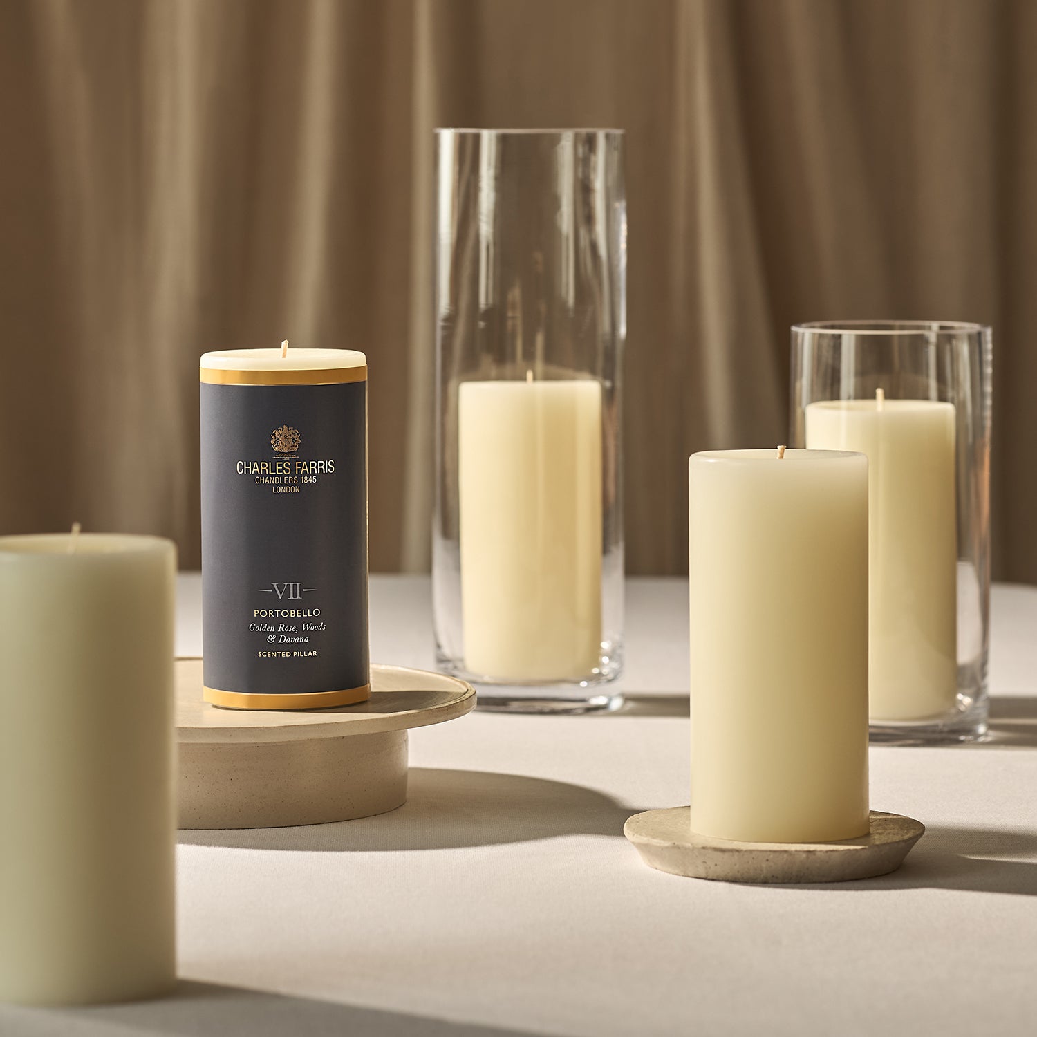 A collection of scented pillar candles. 