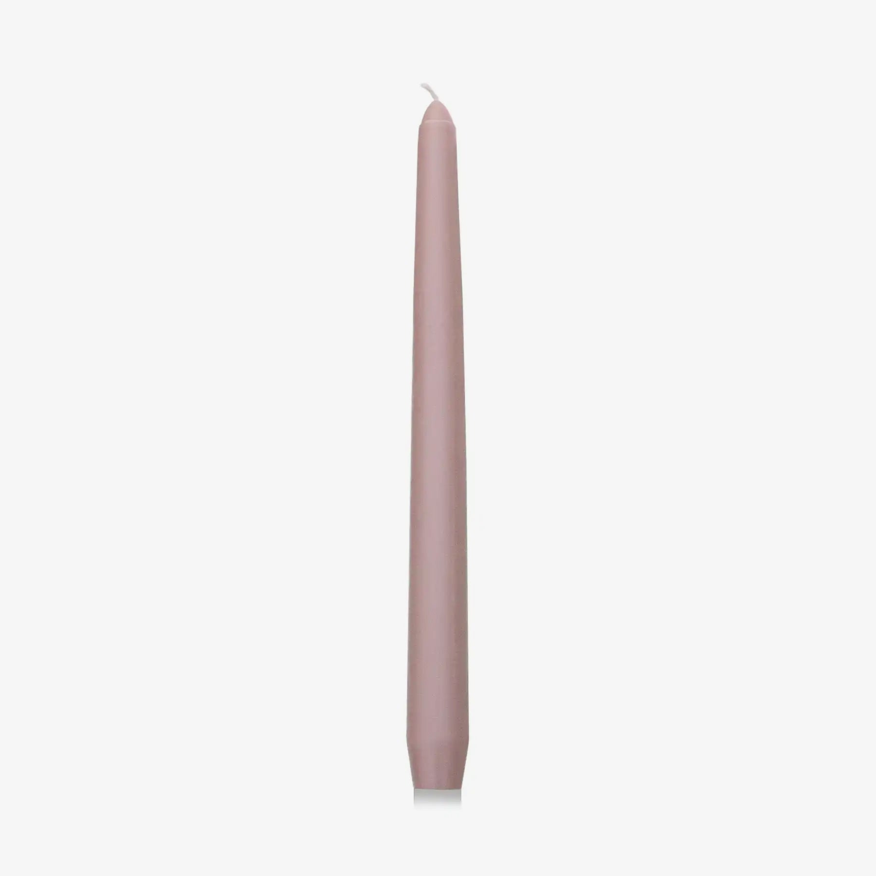 Pink candle on a white background