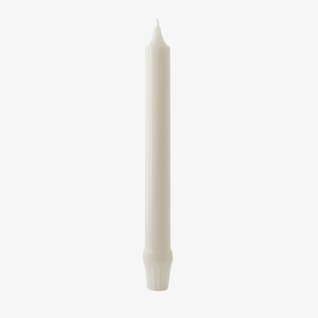 White candle on a white background