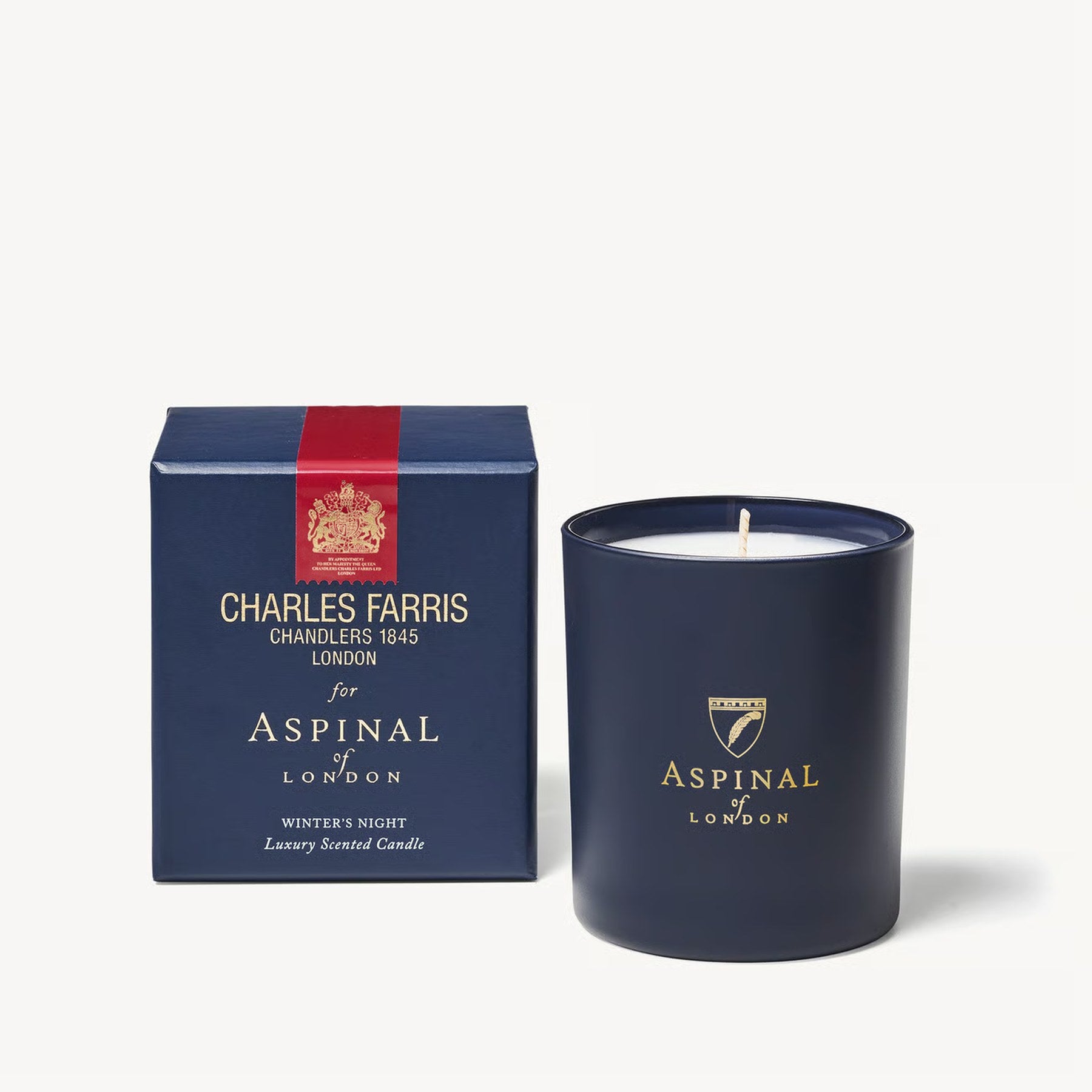 Charles Farris for Aspinal of London Winter's Night branded luxury scented candle with navy and red gift box, a bespoke corporate gift