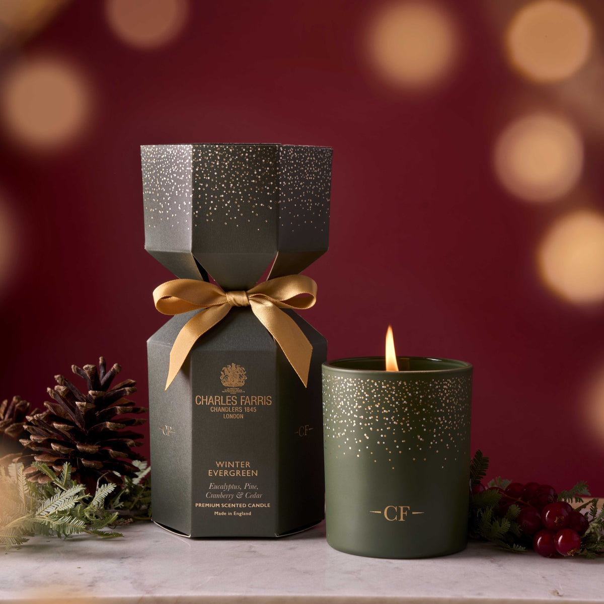 Charles Farris Christmas cracker candle styled in a festive setting