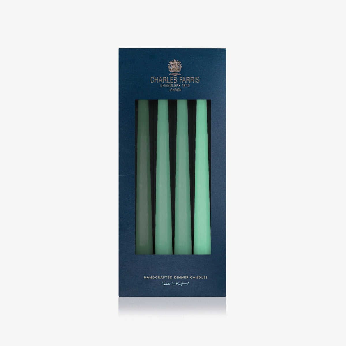 Charles Farris green tonal hanging pair dinner candles in dark green, mid green and aquamarine, three pairs in their navy box, made in England