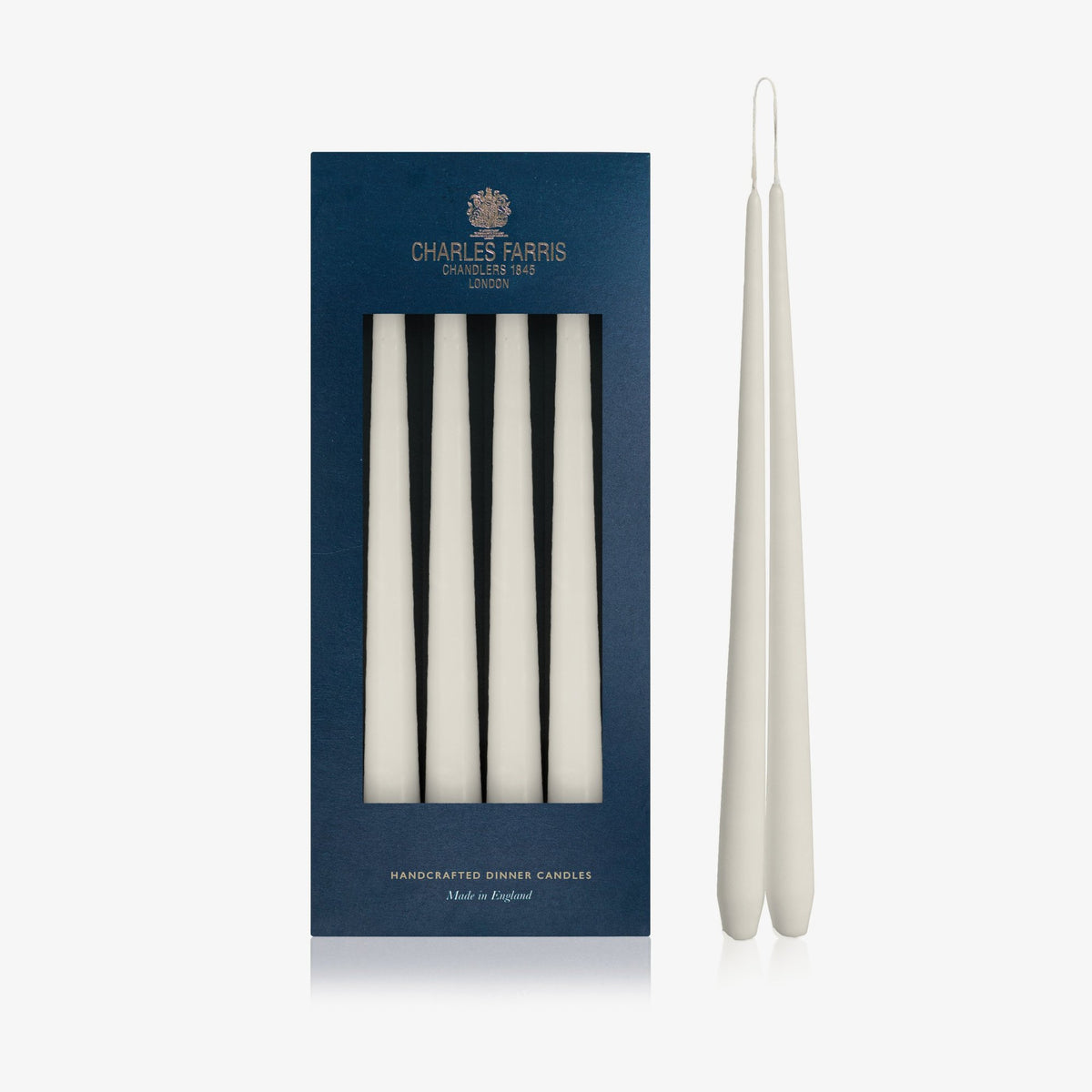 Charles Farris Half Grey hanging pair dinner candles in their navy box, with one pair joined at the wick, made in England