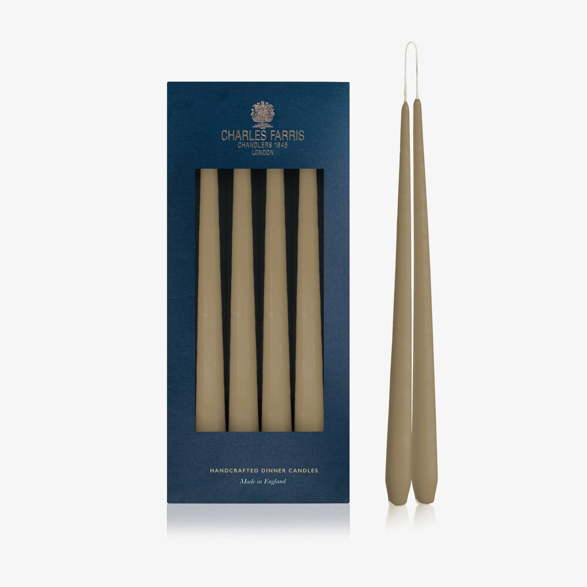 Charles Farris Olive hanging pair dinner candles in their navy box, with one pair joined at the wick, made in England