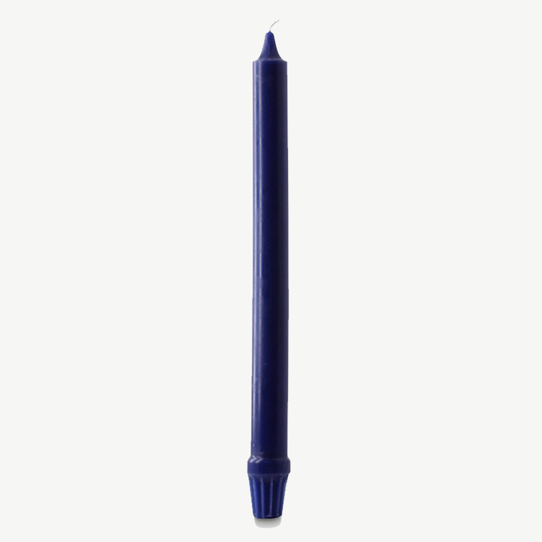Navy blue candle on a white background